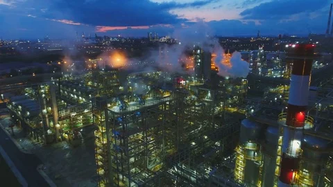 Drone Flies over Refinery Territory with Buildings Covered Steam Stock Footage 81052230