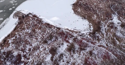 The drone flies over the river coast, then over the frozen Vistula and the ?a Stock Footage 107684000