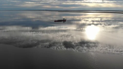 Drone flies over the river Stockbeeldmateriaal 99965930