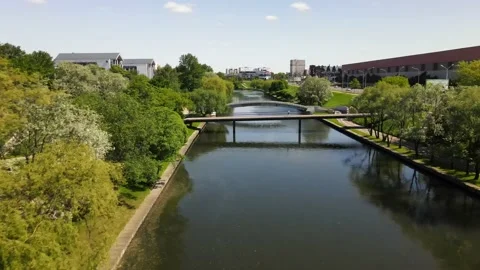 The drone flies over the river in the park. Stock Footage 156070430