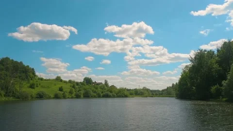 The drone flies over the river in sunny weather in nature. Stock Footage 154709595