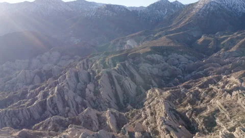 A drone flies over the rugged Devil's Punchbowl landscape, capturing the Stock Footage 280129566
