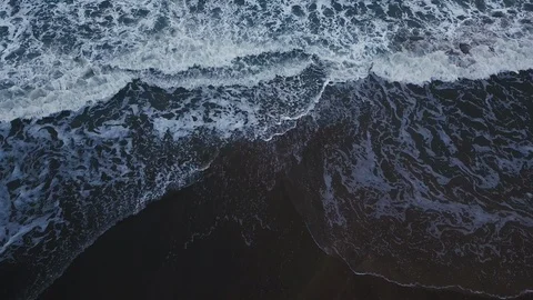 The drone flies over the sea waves. 動画素材 114636287