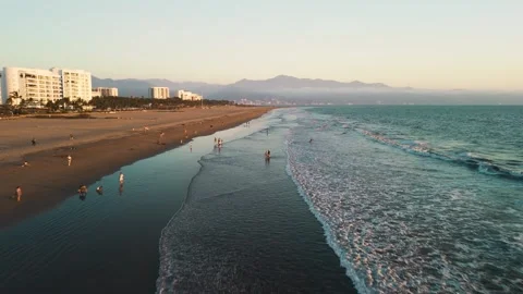 Drone flies over the sea while tourists swim, Nuevo Vallarta Mexico Stock Footage 304695449