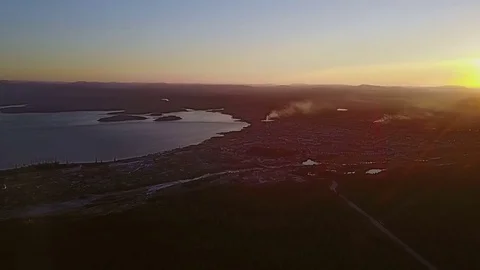 Drone Flies Over a Small City at Sunset Stock Footage 77298064