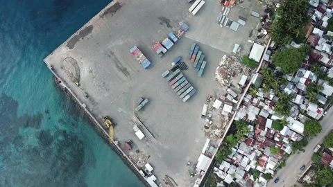 Drone flies over a small seaport in Southeast Asia. Security content. Stock Footage 99162850