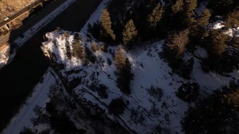 Drone flies over Snow Covered Rocky Mountains near Vail Colorado in Winter Stock Footage 296472040