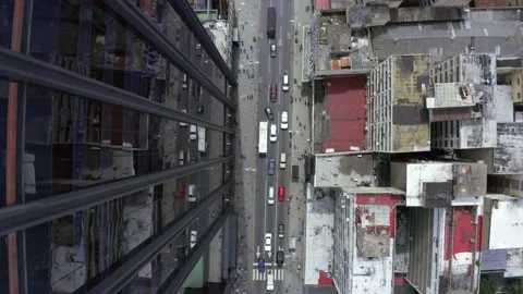 Drone flies over the streets and buildings of downtown in the city of Caracas Video stock 134990086