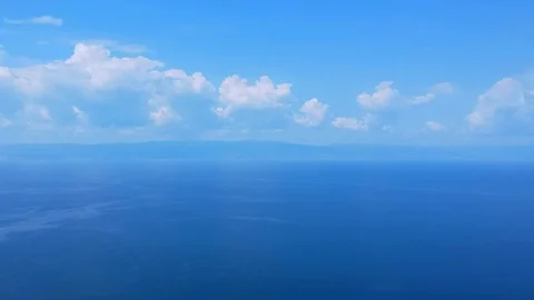 The drone flies over the surface of the water. Lake Baikal, nature of Russia Video stock 123792891