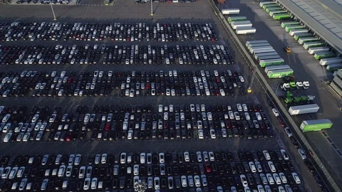 Drone flies over thousands of new cars awaiting export Dartford Stock Footage 92510264