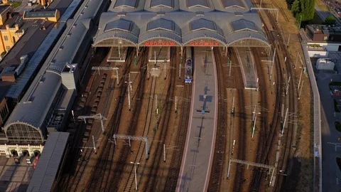The drone flies over the tracks of the main railway station. Stock Footage 108125596