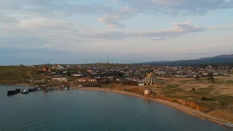 Drone flies over the water. Green field. Top view. Summer holiday. Stock Footage 123774752