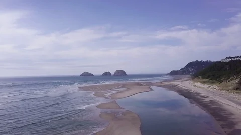 Drone Flies Over Waves Crashing On Shore And Tide Pool On Beach, Oregon Coast Stock Footage 81234492