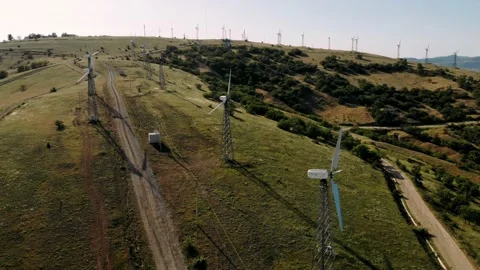 Drone Flies Over a Windmill Park. Aerial View of a Farm With Wind Turbines  Stock Footage 163844453