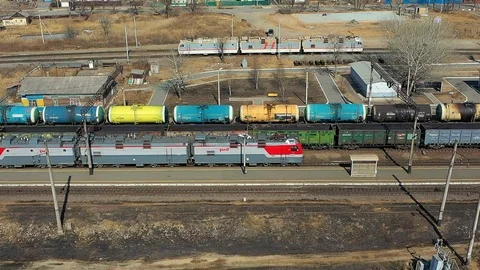 Drone flies parallel to two trains Video stock 104345219