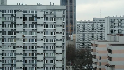 The drone flies past blocks of flats. Video stock 105677698