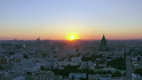 Drone flies at sunset parallel to the sun. Video stock 110717065