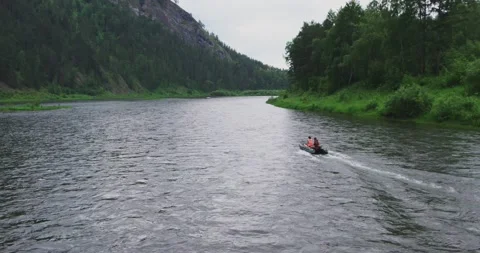 Drone flies on the surface of the water, River in the mountains Stock Footage 173503535