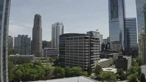 Drone flies through buildings during the day Stockbeeldmateriaal 160922426