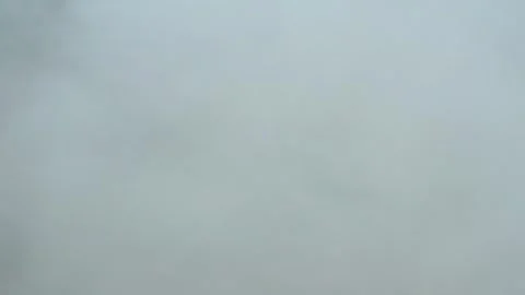 The drone flies through clouds of smoke. Video stock 336104025