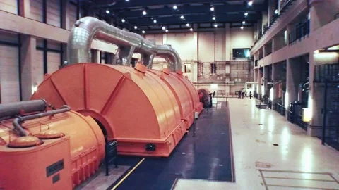 Drone flies through a giant generator turbine room at a european power Stock Footage 135757601