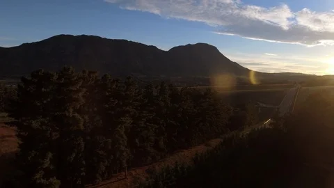 Drone flies through Hemel &amp; Aarde valley near Cape Town at sunrise Video stock 93867483