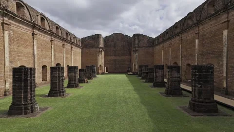 Drone flies through main door of Jesuit Mission ruins in Paraguay Stock Footage 295811757
