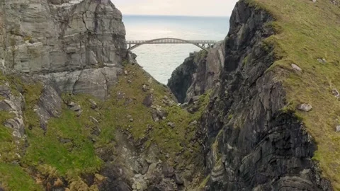 Drone flies towards the Bridge in Mizen Head, Ireland. Stock Footage 233197040