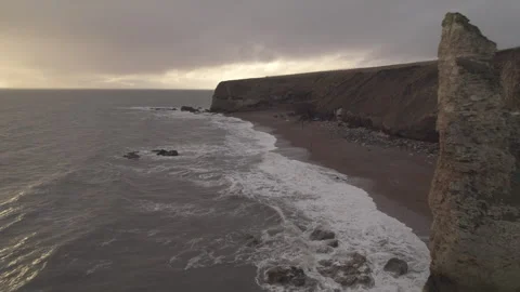 Drone flies towards Noses Point Seaham Stock Footage 240707833