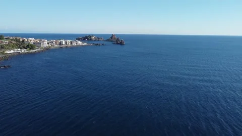 Drone flies towards the stacks of Acitrezza - Sicily travel Video stock 167805823