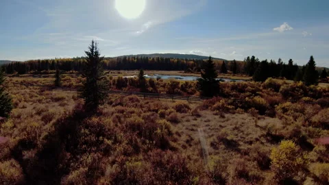 Drone Flies Towards The Sun in Alberta Stock Footage 218637046