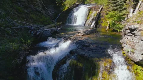 Drone flies up two waterfalls Stock Footage 318476952