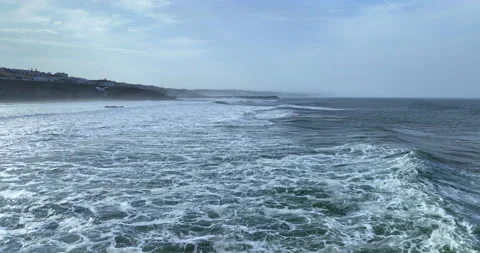 Drone flies under the ocean surface with big foamy waves. Ericeira, Portugal. Stock Footage 218911240