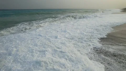 A drone flies very low over a stormy sea. Stock Footage 273830874
