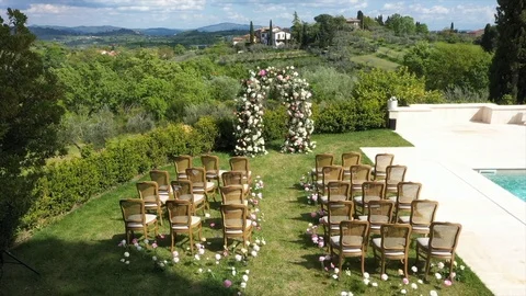 The drone flies to the wedding arch. Stock Footage 107884215