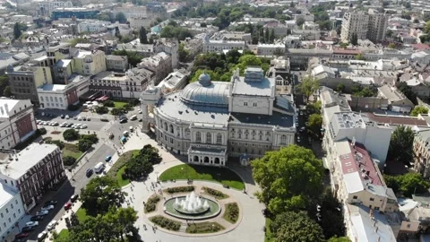 Drone flight above city centre of Odessa near theatre and fountain square Stock Footage 160605613