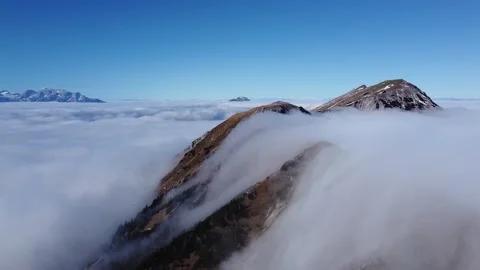 Drone Flight Above Clouds from Mount Stol (Hochstuhl) with View of Triglav Stock Footage 329319487