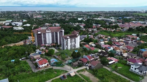 Drone flight above compact city neighborhood in Cebu Philippines 161 Stock Footage 334721972