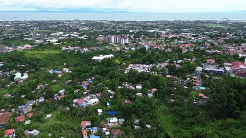 Drone flight above compact city neighborhood in Cebu Philippines 158 Stock Footage 334721995