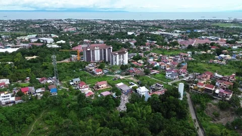 Drone flight above compact city neighborhood in Cebu Philippines 160 Stock Footage 334721997