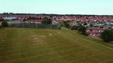 Drone flight above football field HD Stock Footage