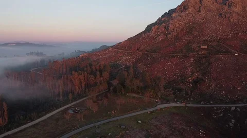 Drone flight above a forest and a mountain at sunset in Galicia Stock Footage 122463868