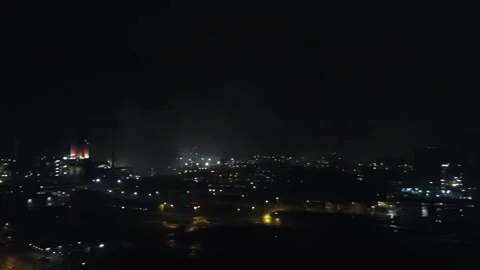 Drone flight above illuminated blast furnace complex Stock Footage 343737033