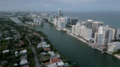 Drone flight above miami beach waterway Stock Footage 346263342