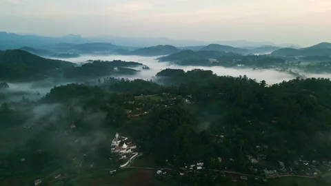 Drone flight above mist covered Haputale mountains at dawn. Misty highlands Stock Footage 274939482