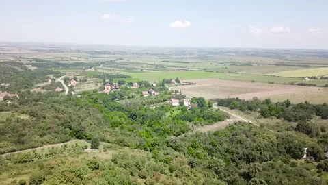 Drone flight above the plains with arable land Stock Footage 142457350