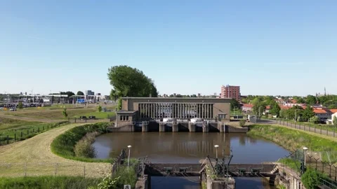 Drone flight above pumping station Gouda Stock Footage 309236516