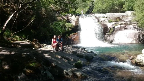 Drone flight above the river on the Melon Waterfall in Galicia Stock Footage 123217338