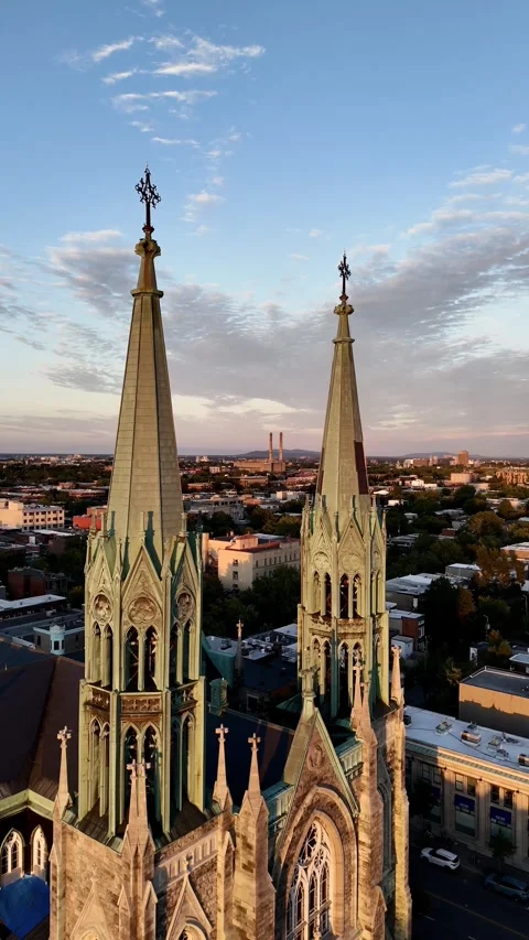Drone flight above the Roman Catholic Saint-Edouard Church in Montreal at sunset Stock Footage 302789093
