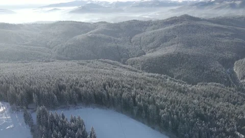 Drone flight above the snow-covered mountains5 Stock Footage 147980363